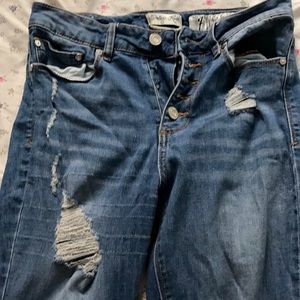 Dark washed skinny ripped jeans